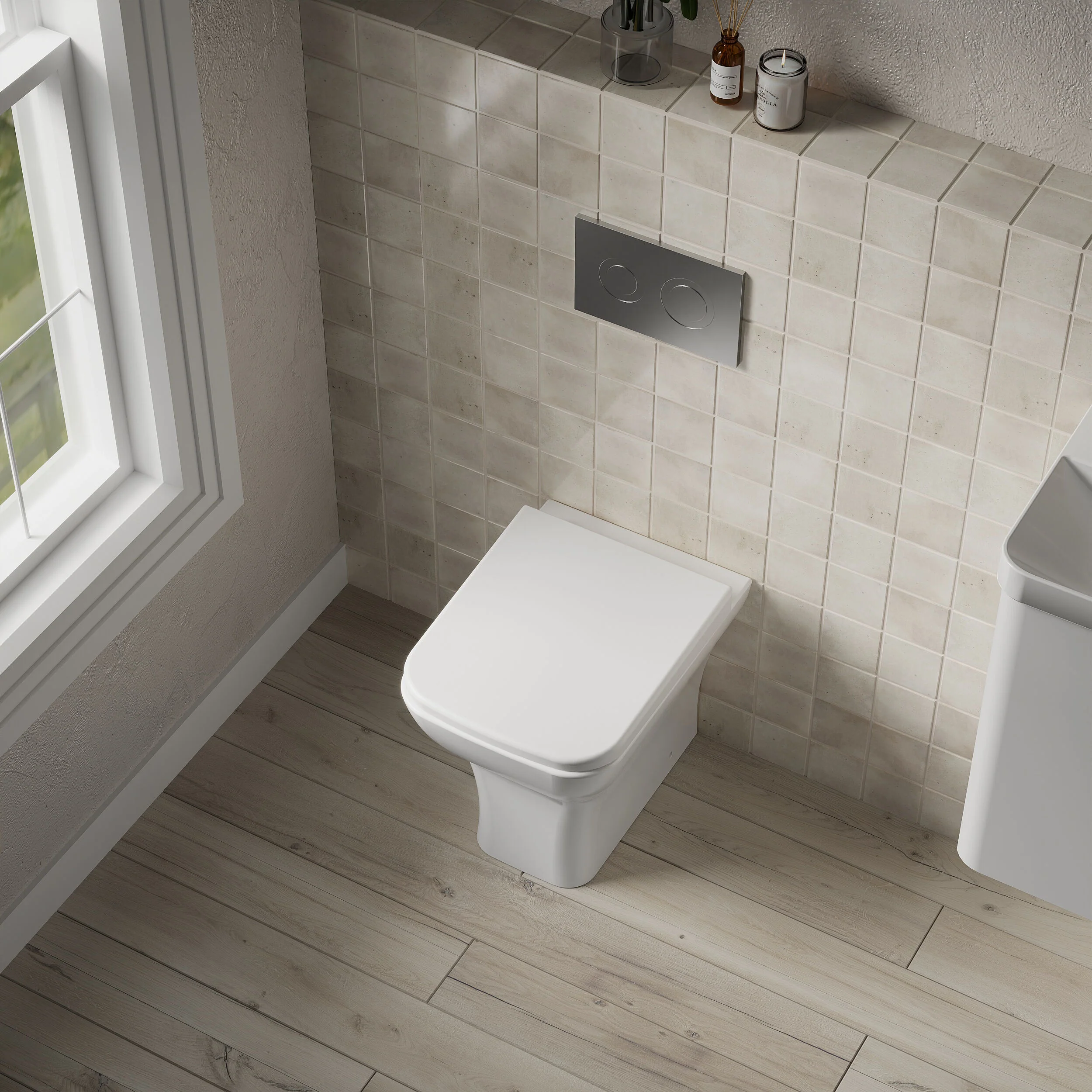Hilderstone Modern Back to Wall Toilet Pan with Soft Close Seat - Image 3